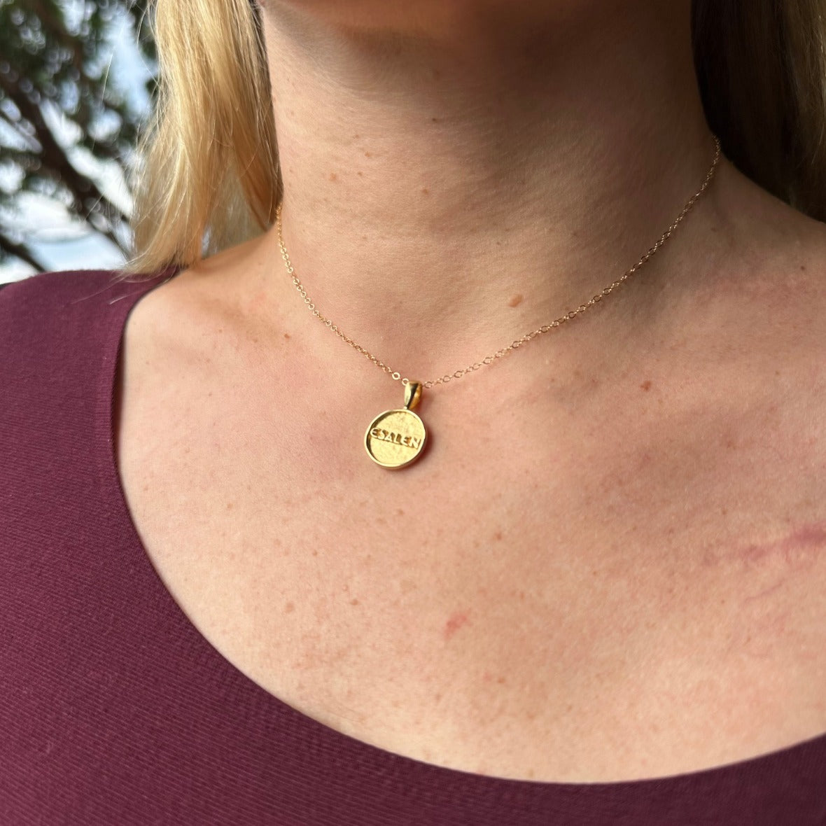 Esalen Accessories - Esalen Charm Necklace in Gold on staff member