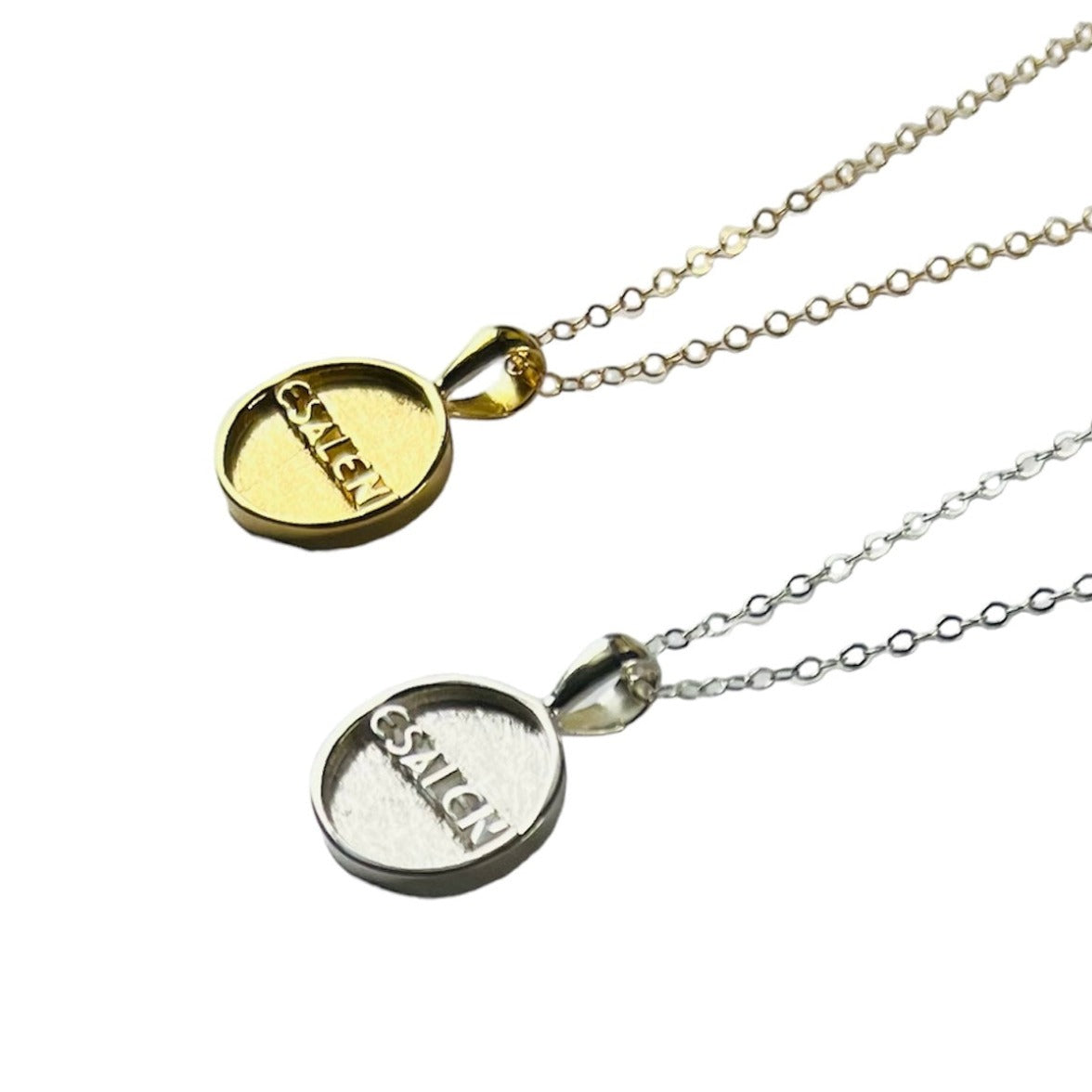 Esalen Accessories - Esalen Charm Necklace in Gold, with silver necklace,  isolated side view