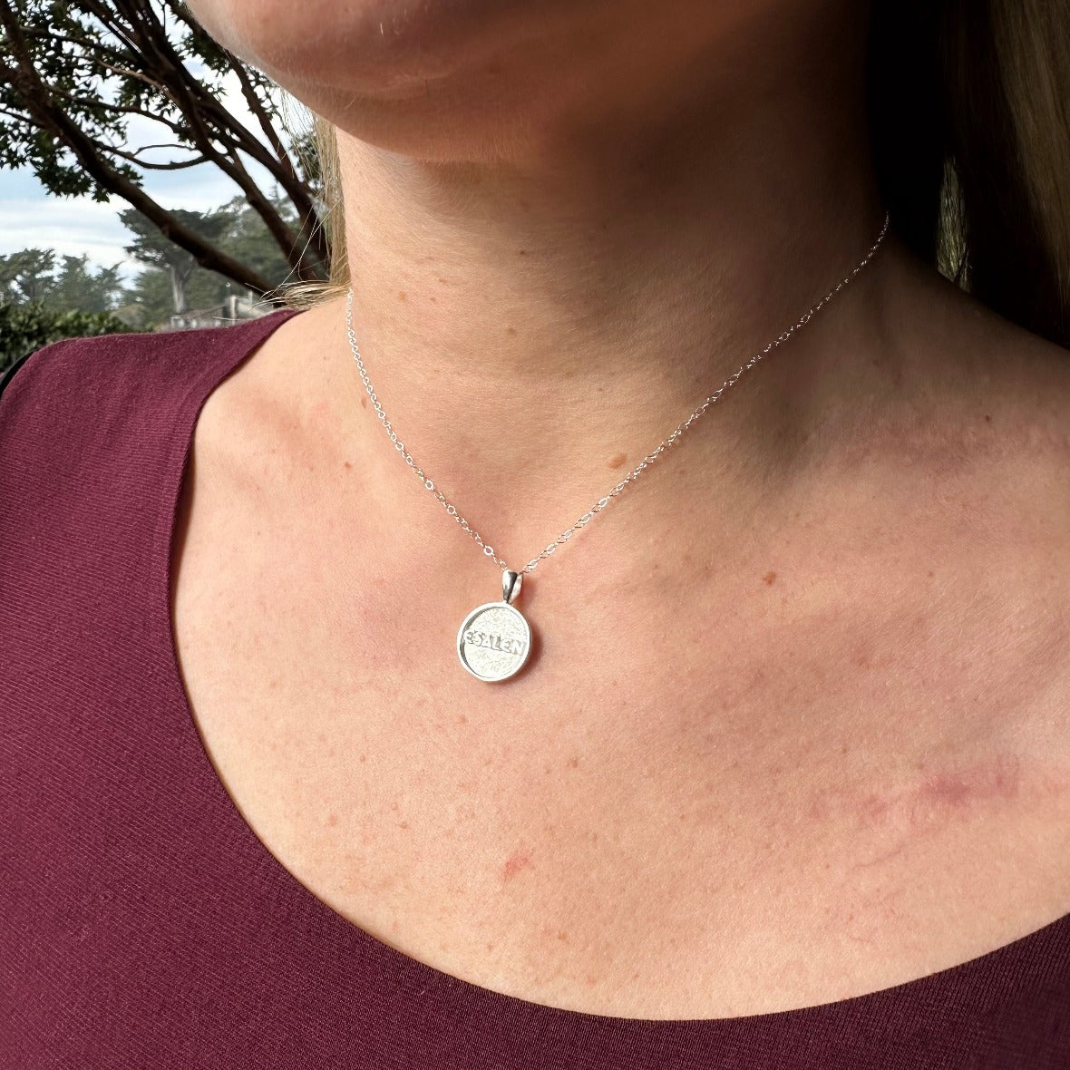 Esalen Accessories - Esalen Charm Necklace in Silver on staff member